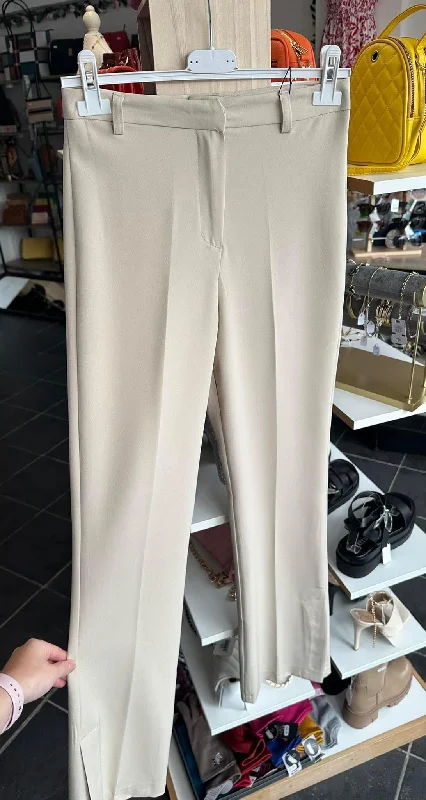 Cream high waisted split hem trousers Trousers Exclusive Limited