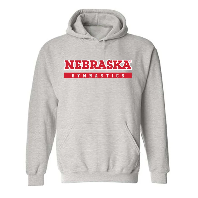 Nebraska - NCAA Women's Gymnastics : Molly Peterson - Classic Shersey Hooded Sweatshirt Hoodie with Hem Embroidery Detailed Premium